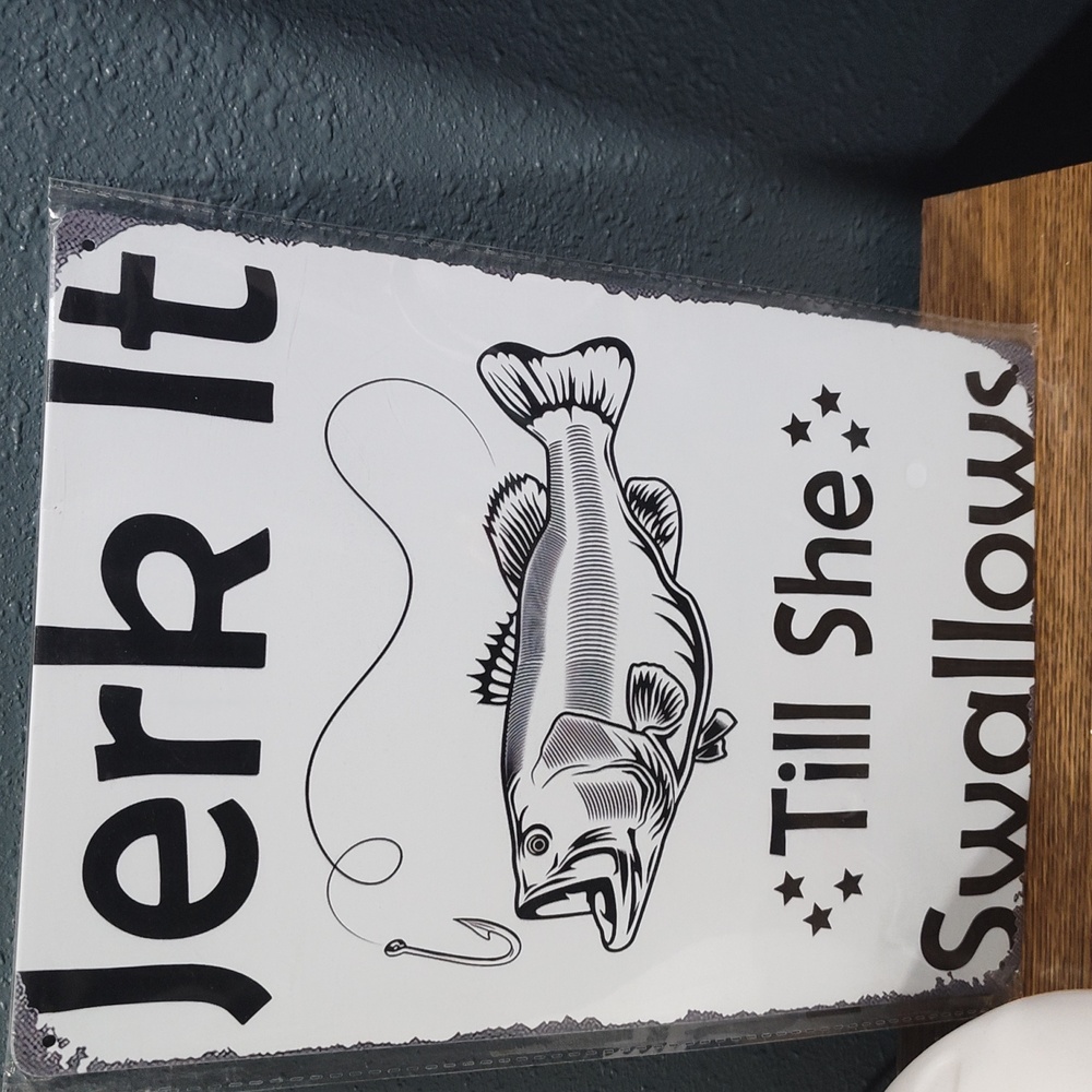 Tin sign